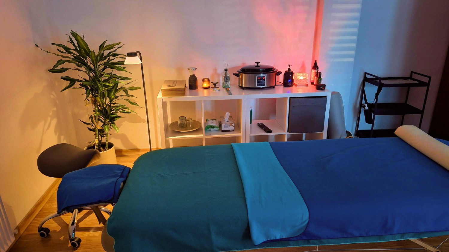 Therapy Room at Professional Massage Nicosia - massage table covered with green linens